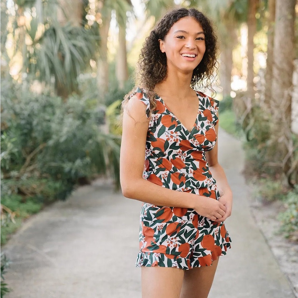 MOMOOP Swim Romper. Brand New. Never been worn. Size L.